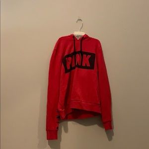 Red hoodie from pink